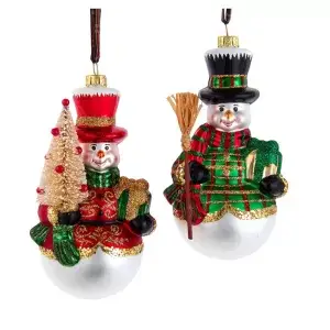 Sneeuwpop met rood jasje