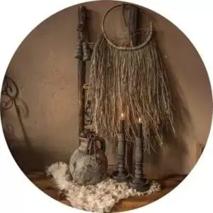 Zwarte kaarsen met kruik